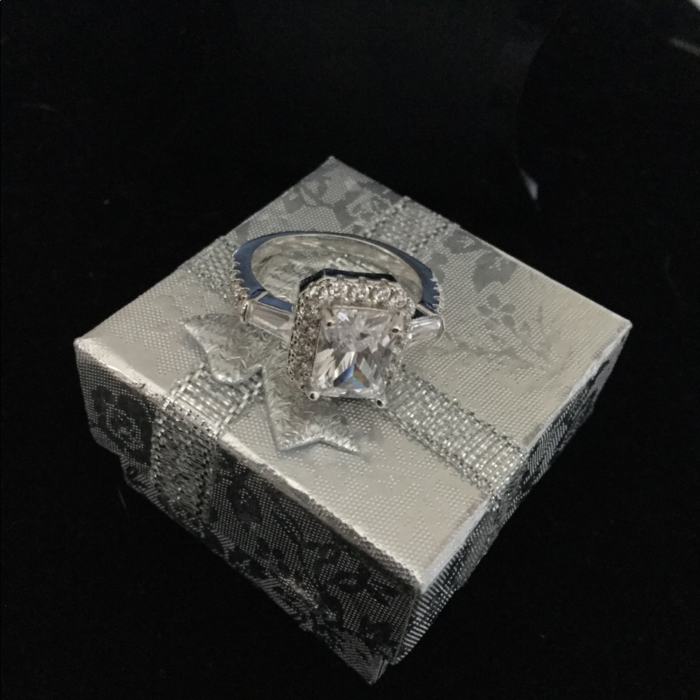 Sterling silver ring with white sapphires